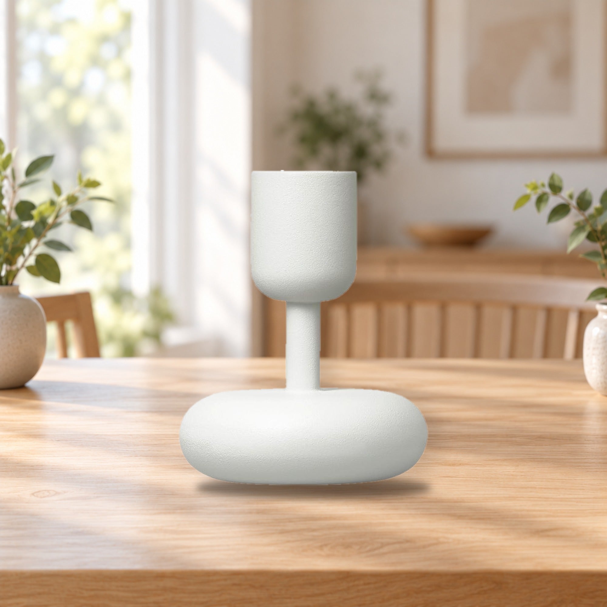 Iittala Nappula Candleholder 107mm White – product photo on a table