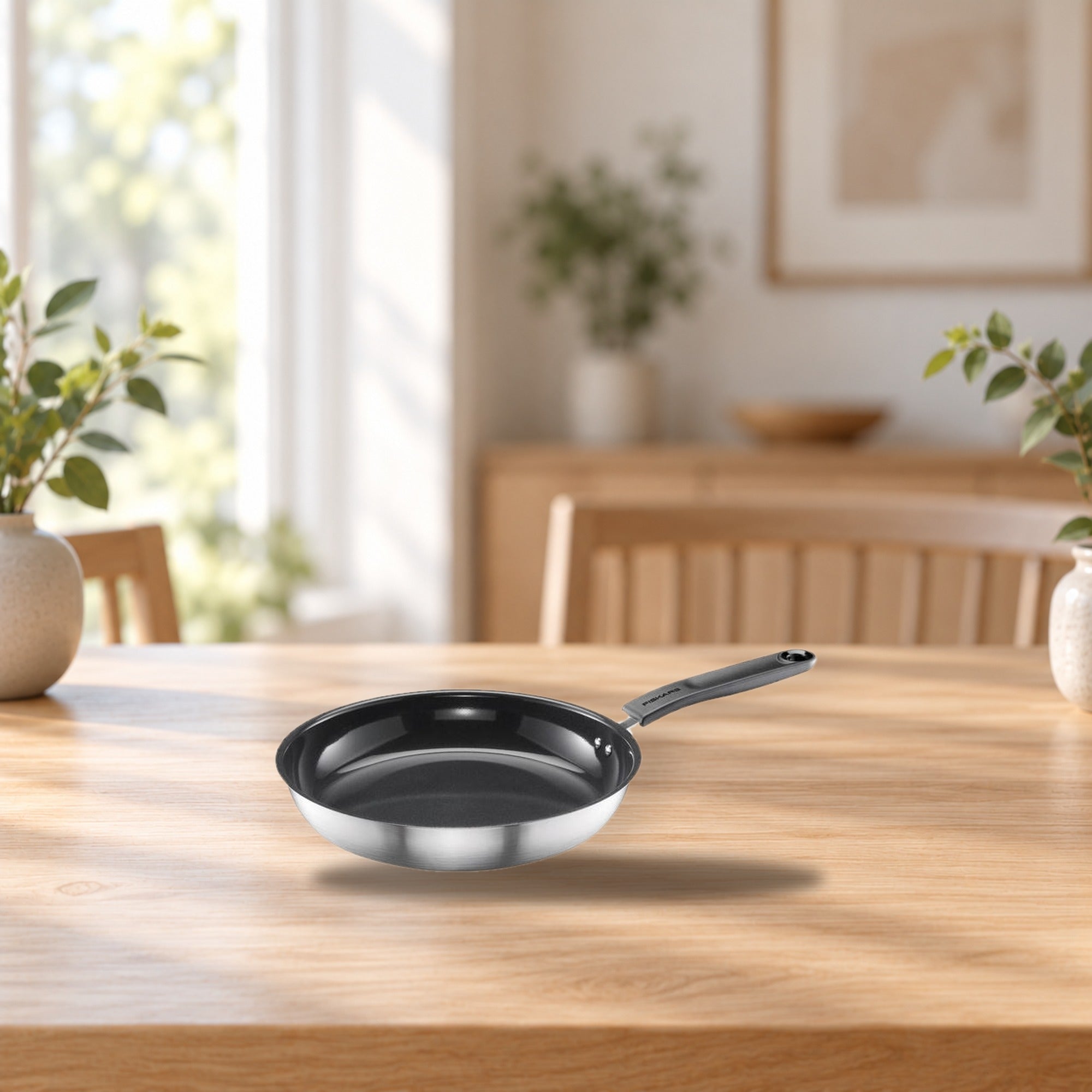 Fiskars Functional Form Frying Pan 26 cm – product photo on a table