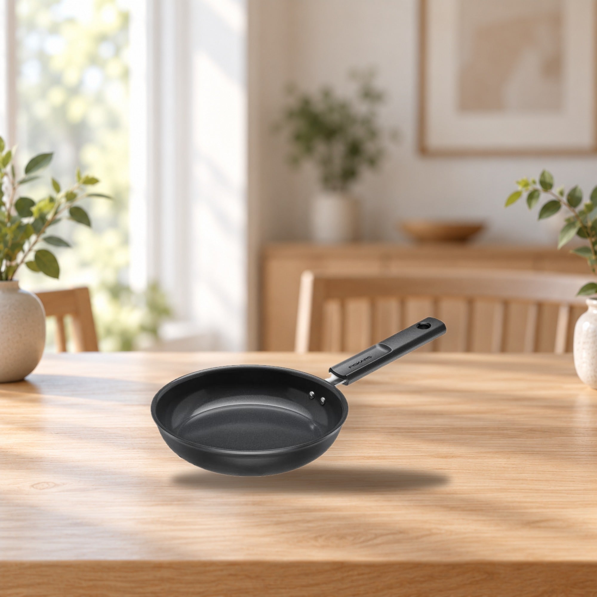 Fiskars Hard Face Frying Pan 20 cm – product photo on a table