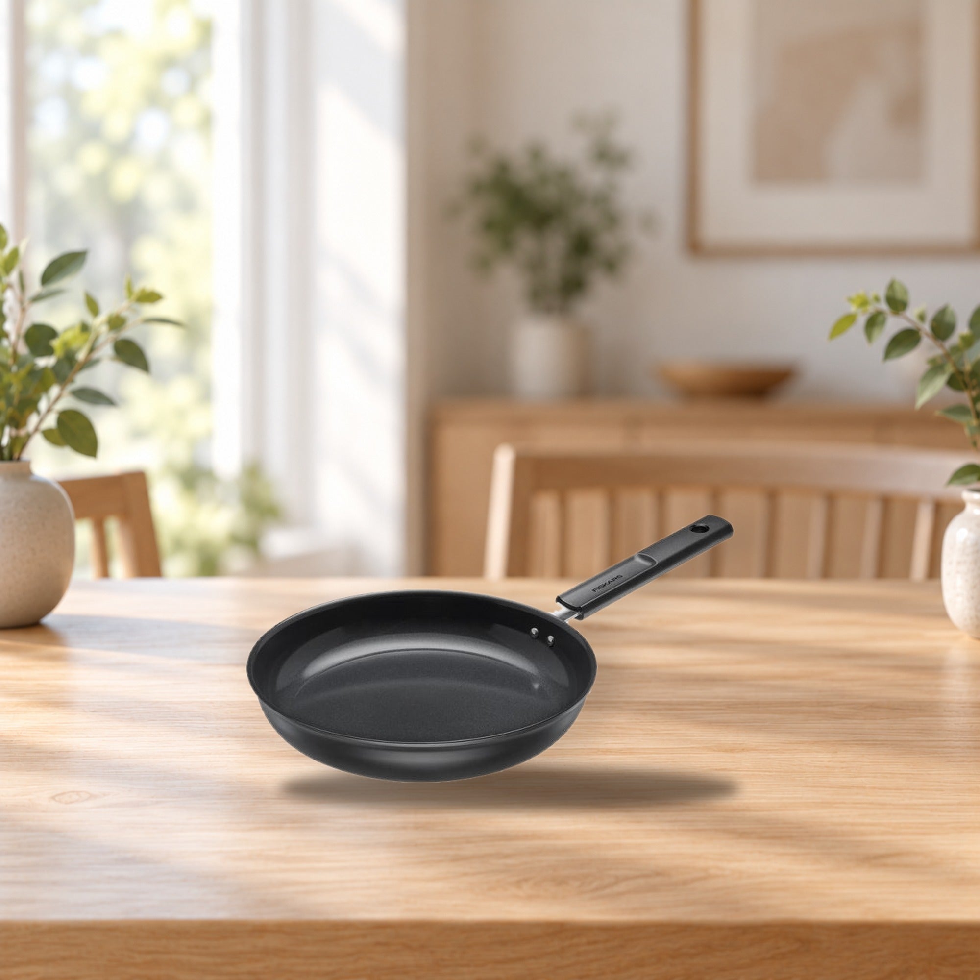 Fiskars Hard Face Frying Pan 26 cm – product photo on a table