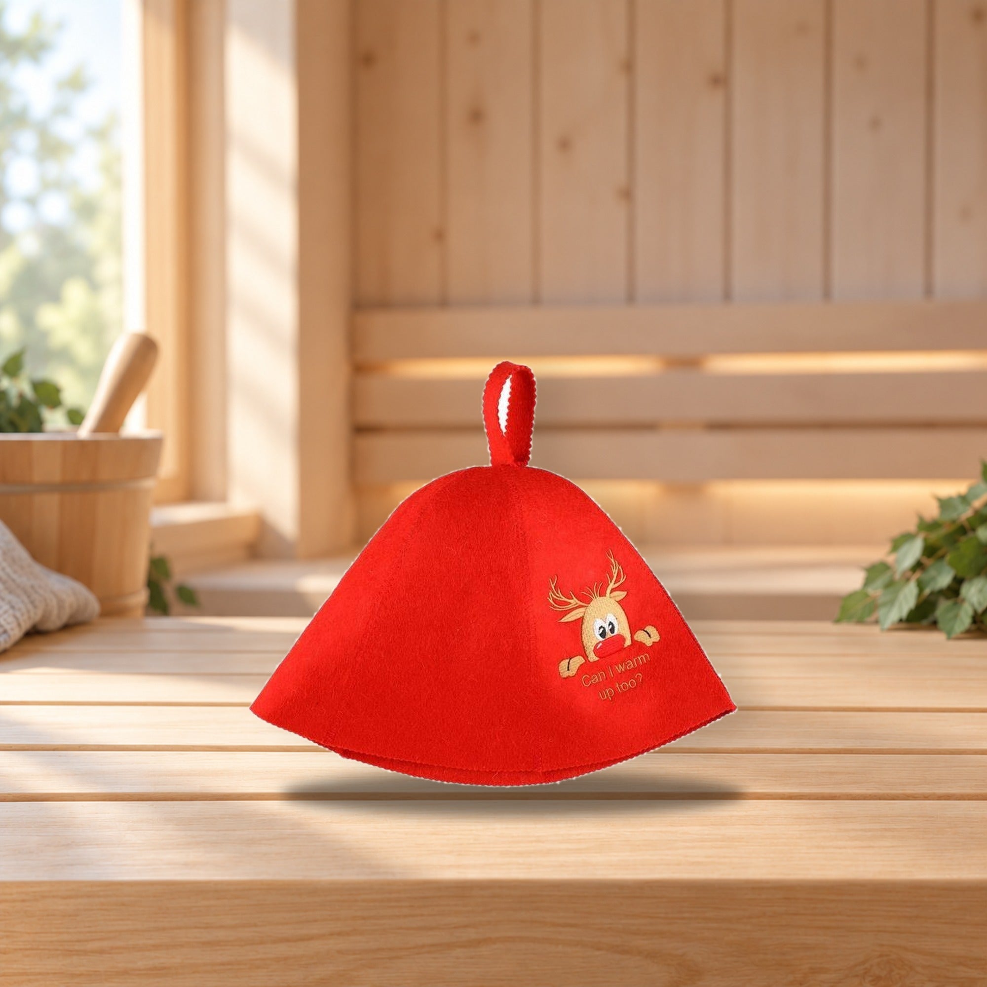 Winteria Sauna Hat Red Reindeer – product photo on a table