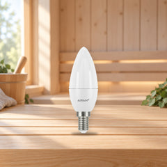 Airam Sauna LED Candle 4.7W E14 470lm 2800K Opal Lamp – product photo on a table