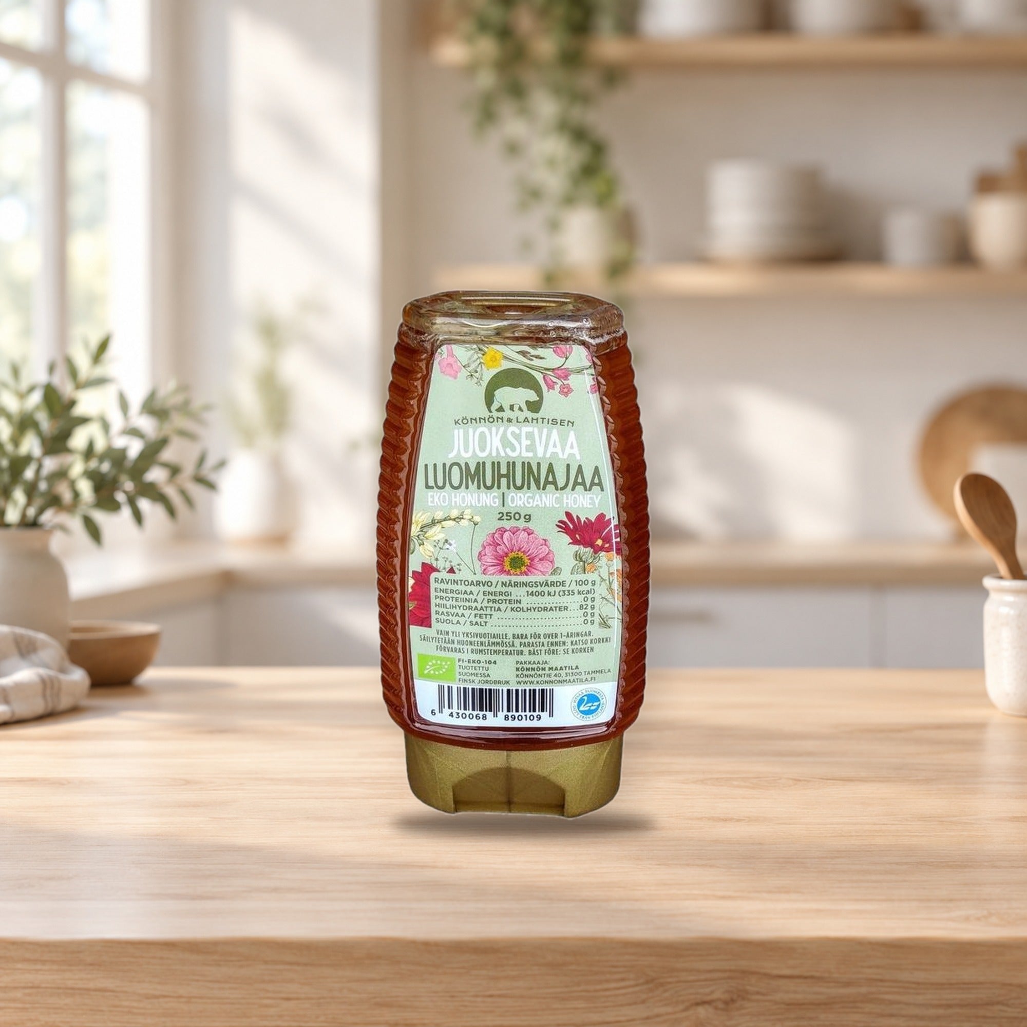 Könnön & Lahtinen Organic Liquid Honey 250g – product photo on a table