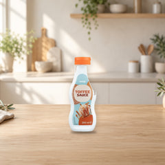 Coop Toffee Dessert Sauce 250 ml – product photo on a table