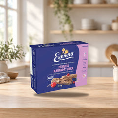 Elovena Soft Oat Biscuits with Cranberry, Raspberry, Blueberry – product photo on a table