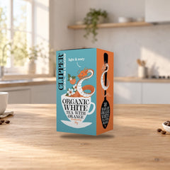 Clipper Organic White Tea with Orange Flavor – product photo on a table