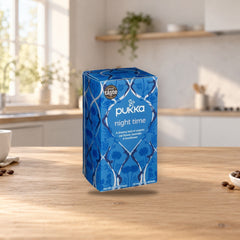 Pukka Night Time Organic Herbal Tea – product photo on a table