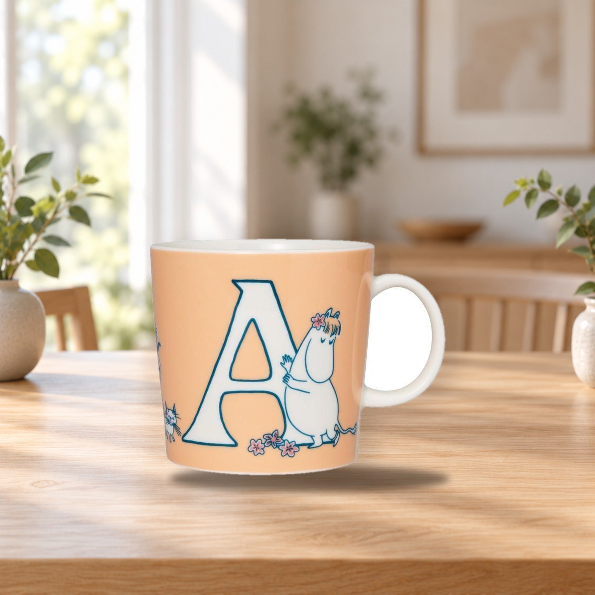 Moomin Mug 0.4L ABC Alphabet A – product photo on a table