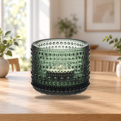 Iittala Kastehelmi Votive 64mm Forest Green Candle Holder – product photo on a table