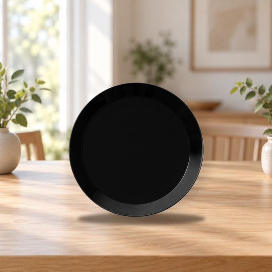 Iittala Teema 21cm Flat Plate Black – product photo on a table