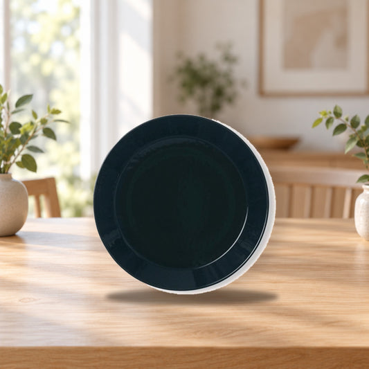 Iittala Teema Plate 26cm Black – product photo on a table
