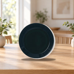 Iittala Teema Plate 26cm Black – product photo on a table