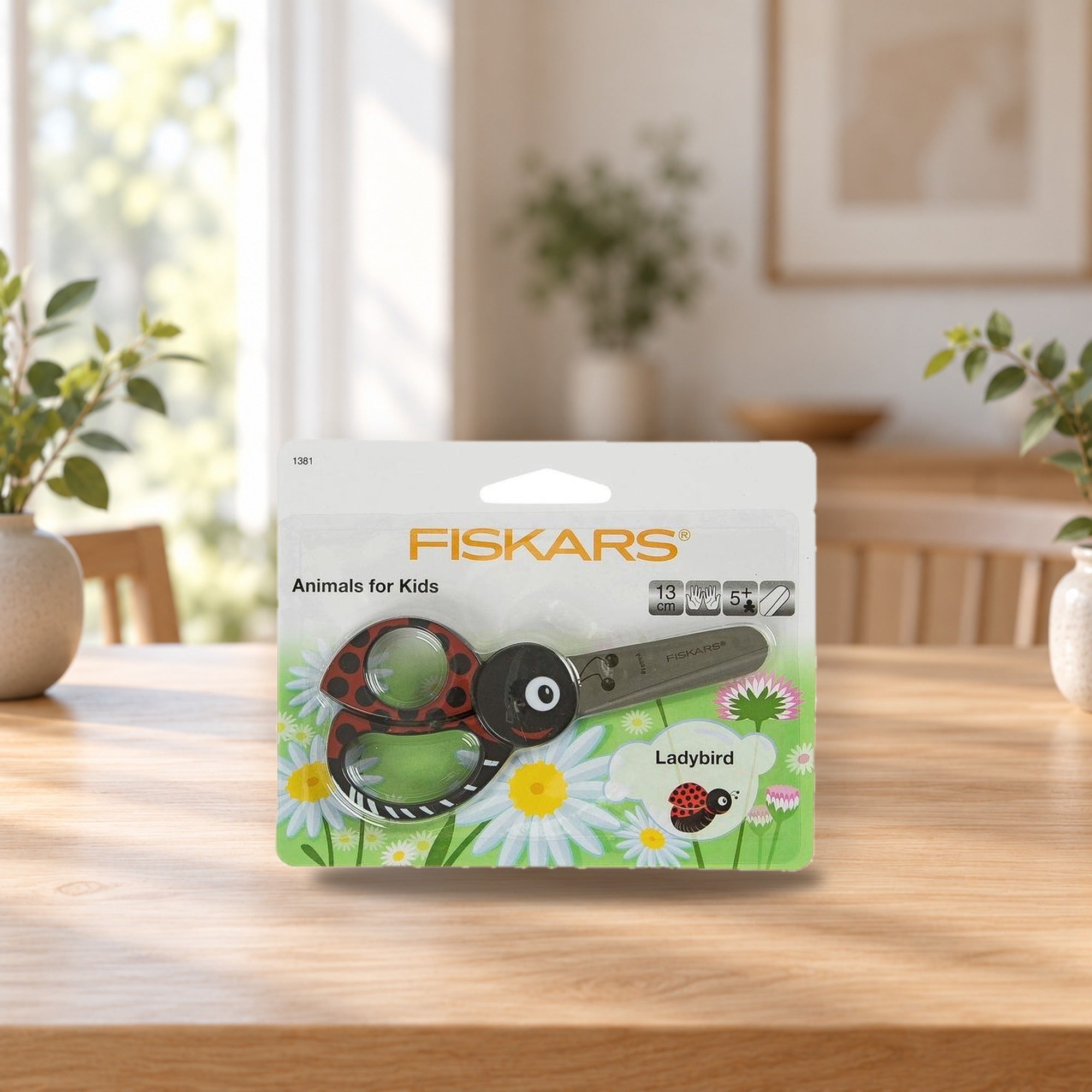 Fiskars Kids Scissors Ladybird 13 cm – product photo on a table