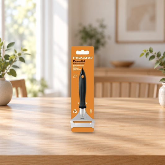 Fiskars Essential Soft Cheese Slicer 17cm – product photo on a table