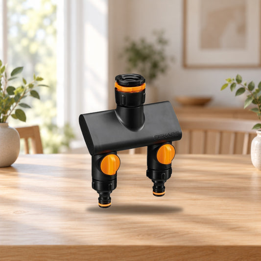 Fiskars Comfort Faucet Connector with Two On/Off Valves – product photo on a table