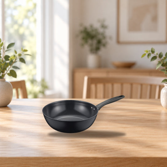Fiskars Sorsakoski 28 cm Ceramic Wok Pan – product photo on a table