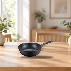 Fiskars Sorsakoski 28 cm Ceramic Wok Pan – product photo on a table