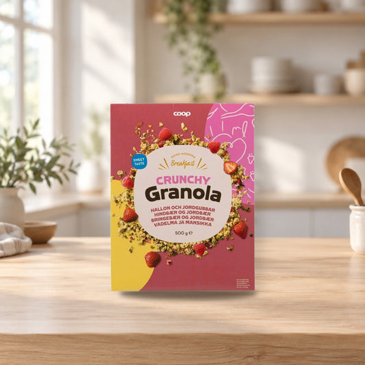 Coop Crunchy Granola Raspberry Strawberry 500g – product photo on a table
