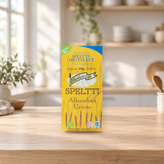 Organic Large Spelt Flakes 600g – product photo on a table