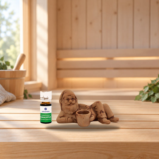 Emendo lying sauna elf + eucalyptus sauna fragrance 10ml – product photo on a table