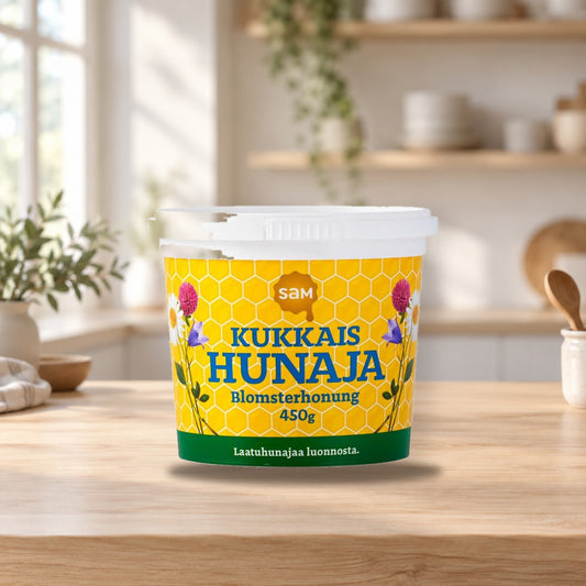 Hunajainen SAM Flower Honey 450g – product photo on a table