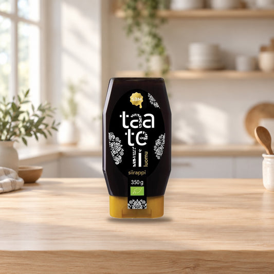 Organic Date Syrup 350g – product photo on a table