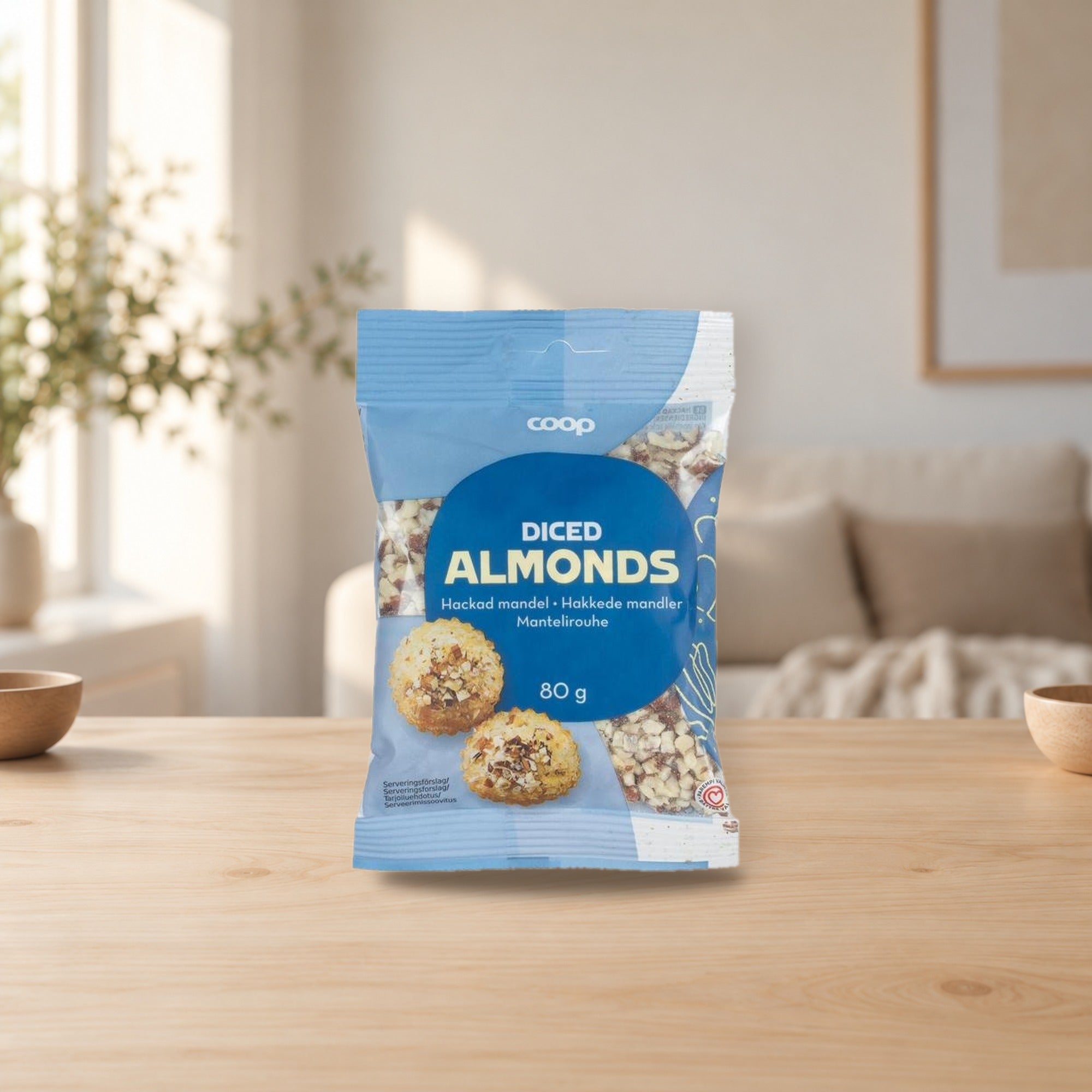 Coop Almond Crumbs 80g – product photo on a table