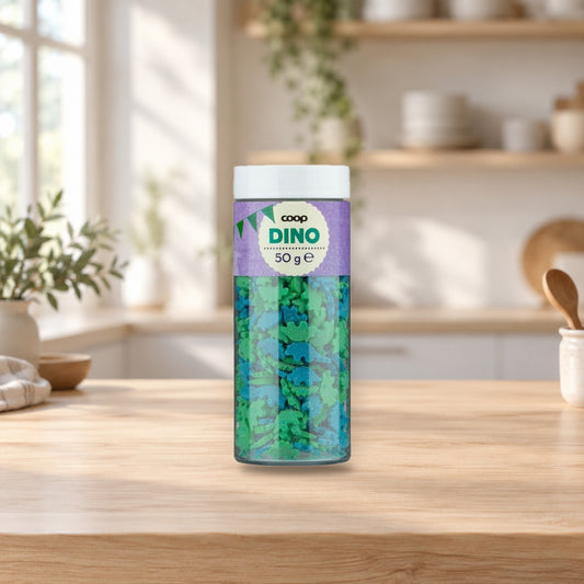 Coop Dino Sprinkles 50g – product photo on a table
