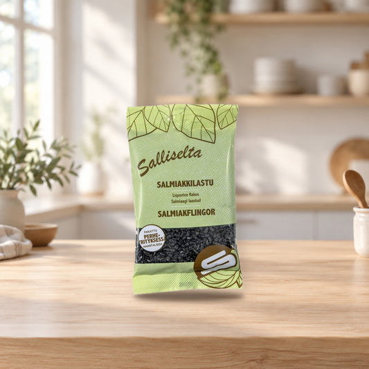 Sallinen Salmiak Flakes 100g – product photo on a table