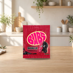 Bubs Skalle Raspberry Salty Licorice Candy 155g – product photo on a table