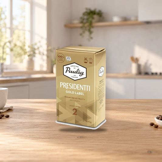 Paulig Presidentti Gold Label Coffee 500g – product photo on a table