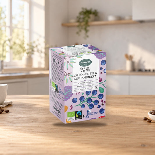 Nordqvist Hellä White & Blackcurrant Tea 30g Box – product photo on a table